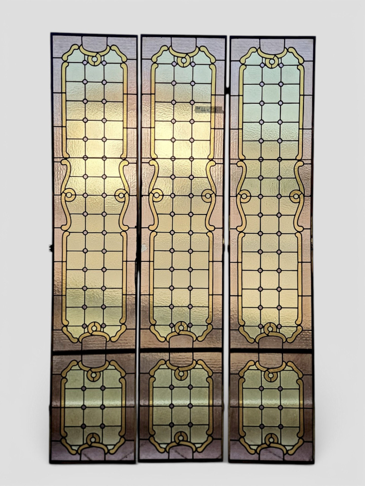 Three early 20th-century leaded cathedral stained glass windows - 216 cm x 44 cm